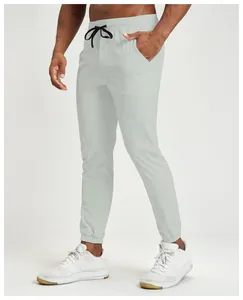 Comfortable men's light grey quick-dry joggers for outdoor fitness and athletic training