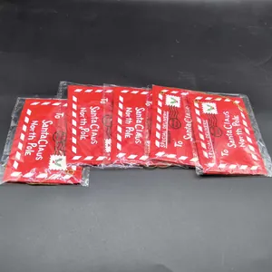 Set of 5 red non-woven Christmas card envelopes with Santa Claus hanging strings