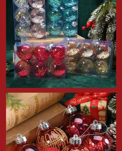 Close-up of glittery red and gold Christmas ball ornaments in a festive holiday gift setting.