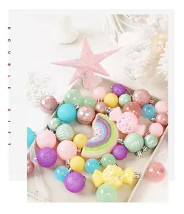 Close-up of macaron color Christmas ornaments set including candy and rainbow shapes.
