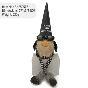 Cool rocking gnome doll wearing sunglasses and black leather hat with resin face details.