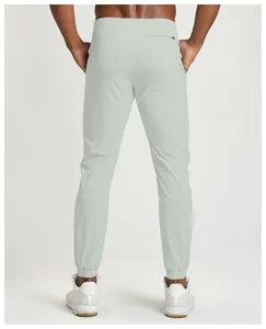 Back view of men's light grey breathable joggers for fitness and outdoor sports
