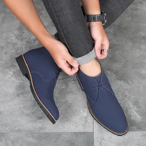 Men's casual navy blue suede boots with pointed toe and lace-up design