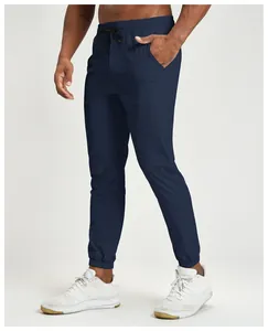 Detail of navy blue quick-dry recycled sports jogger pants for men with drawstring