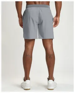 Back view of men's grey eco-friendly quick-dry athletic shorts for tennis and running