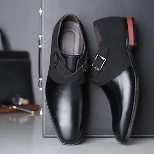 Elegant black patchwork leather monk strap dress shoes for men with stylish buckle detail
