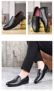 Close-up of men's slip-on loafers with stylish woven leather texture details