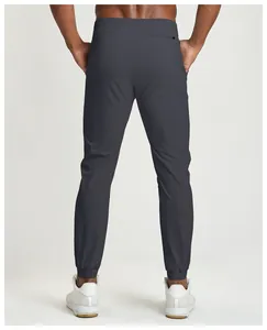 Rear view detail of dark grey men's quick-dry outdoor fitness sports joggers pants