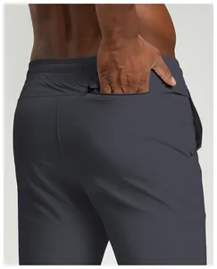 Detail view of the back zippered pocket on men's quick-dry breathable athletic pants