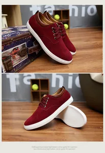 Detailed view of burgundy cow suede men's sneakers with durable white non-slip sole.