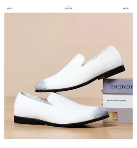 Detailed view of white men's slip-on loafers with woven texture and faded grey toe design