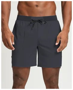 Close-up of quick-dry men's grey sports shorts with drawstring waistband