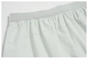 Detailed close-up showing the breathable mesh waistband of eco-friendly men's sports shorts