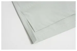 Close-up of side slit and reinforced stitching on men's quick-dry athletic shorts.
