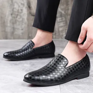 Stylish men's black woven leather loafers featuring a business casual slip-on design for daily wear