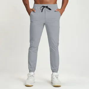 High-performance men's breathable quick-dry athletic joggers with drawstring waist in light grey