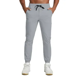 Sustainable breathable quick-dry men's grey sports joggers with drawstring waist.