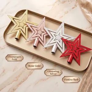 Set aus galvanisierten Christbaumspitzen-Sternen in Gold, Silber und Rot auf Tablett