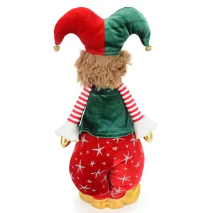 Back view of a colorful handmade circus clown doll with red and green velvet jester hat.
