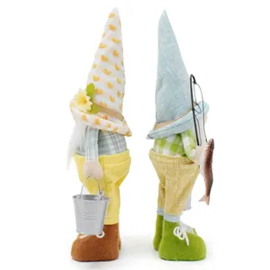 Side view of cute fishing gnomes featuring a heart hat, bucket and fishing rod detail