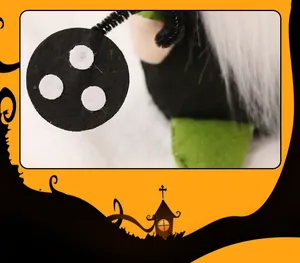 Close-up detail of Halloween witch gnome doll showing felt fabric texture