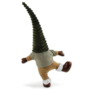 Detail of standing Christmas gnome with tall green hat in a playful one-leg pose