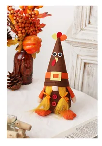 Close-up of a festive turkey gnome doll for Thanksgiving and Halloween décor