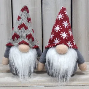 Detail view showing the soft knitted textures and patterns of the Christmas gnomes.