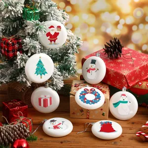 Festive display of white circular Christmas tree ornaments with colorful holiday prints