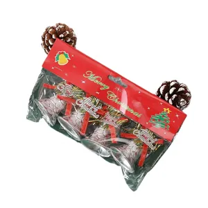 Set of decorative silver Christmas bells with Merry Christmas text for tree hanging