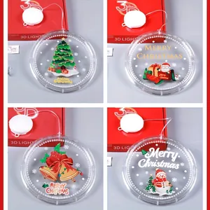 Détail de quatre modèles de suspensions de Noël rondes à LED avec ventouse décorative