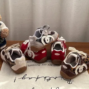 Detailed display of toddlers' soft-sole sneakers in various colors and patterns