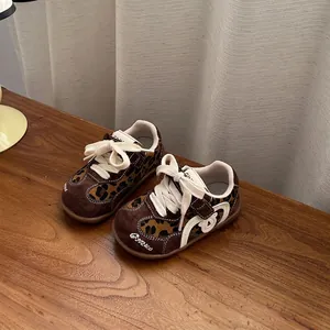 Brown leopard print toddler sneakers with soft soles and white laces