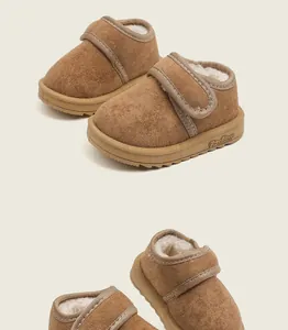 Detailed view of warm baby snow boots featuring soft non-slip soles and thick plush lining