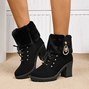 Stylish black faux fur trim boots with chunky heels and elegant rhinestone accents for women.