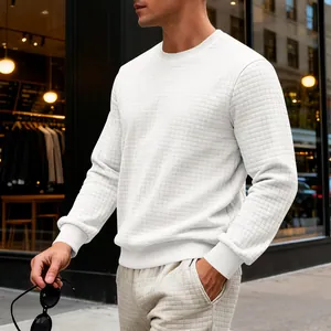 Detail shot of men's white sweatshirt with unique small square grid texture pattern