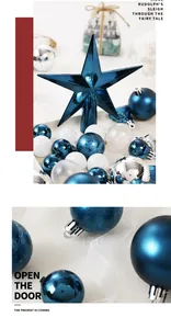 Detailed view of 40pcs blue and white Christmas bauble ornaments with a star tree topper