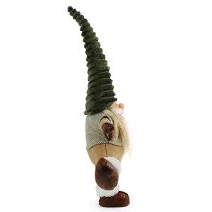 Detailed side view of a plush Christmas gnome figurine standing on one leg for holiday decor.