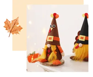 Close-up of adorable Thanksgiving turkey gnome plush dolls for autumn home decor