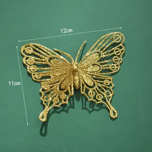 Decorazione farfalla dorata glitterata per Natale con misure di dimensione 12x11cm