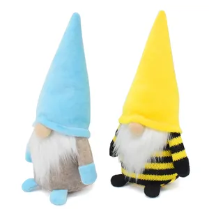 Two handmade decorative gnome plush dolls featuring blue and yellow bee-themed outfits