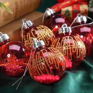 Set of red Christmas ornaments with gold glitter mesh and festive filling for tree decor