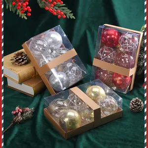Collection of shiny and patterned Christmas ball ornaments in festive craft gift boxes