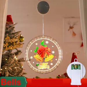 Détail d'une suspension de Noël à LED circulaire avec motif de cloche et boîtier à piles
