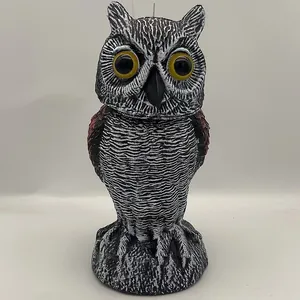 Realistic owl decoy bird deterrent with detailed feather texture and yellow eyes