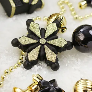 Élégant ensemble de flocons et boules de Noël noirs et dorés pour la décoration d'arbre
