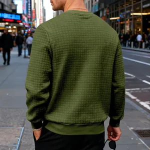 Back view of men's olive green long-sleeve crewneck sweatshirt with fine waffle grid texture