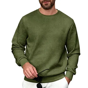 Close-up detail of men's olive green waffle knit crewneck sweatshirt showing textured fabric