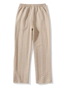Detailed view of beige cable-knit lounge pants with a comfortable elastic waistband