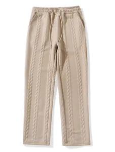 Close-up view of beige cable knit lounge pants with drawstring waist for men